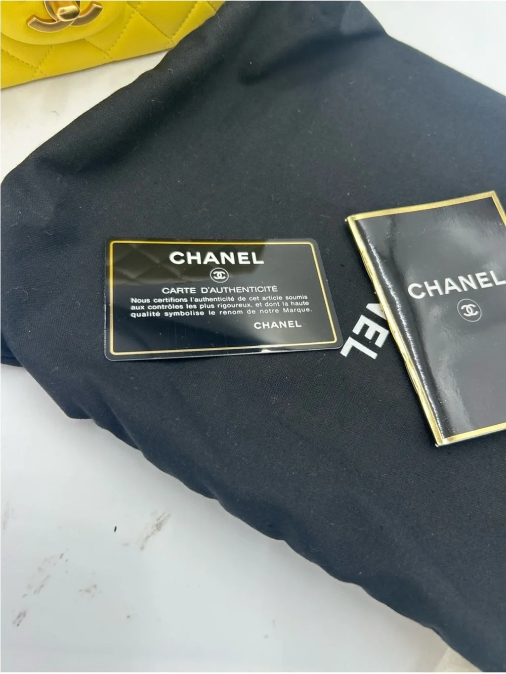 CHANEL CLASSIC QUILTED double flap bag . Yellow with gold hardware .